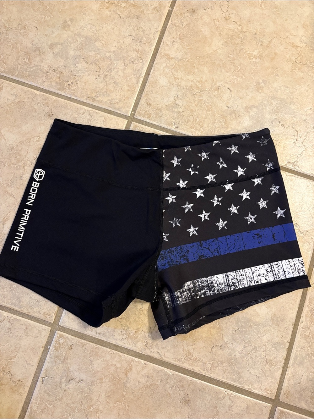 Born Primitive Women’s Black Athletic Shorts with Blue Accent & White Stars